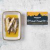 Patagonia Provisions Spanish Roasted Garlic White Anchovies, 4.2oz styled open marble BG For WEB