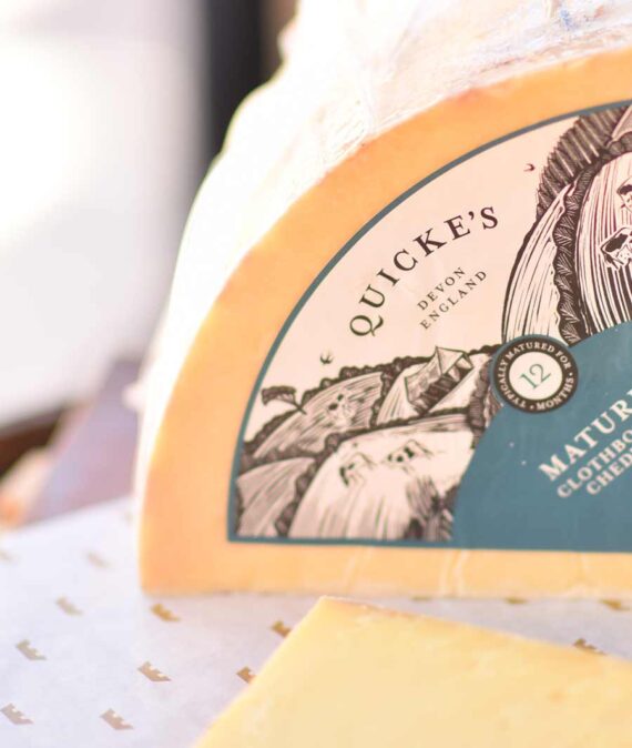 Quicke’s Farmhouse Cheddar per 1/2 lb (8 oz) Caputo's Market & Deli